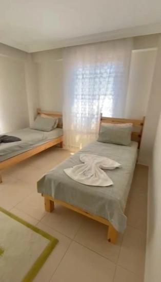 Möblierte 2+1-zimmer-wohnung In Beldibi Zu Vermieten, Mit Separatem Eingang Und Garten.