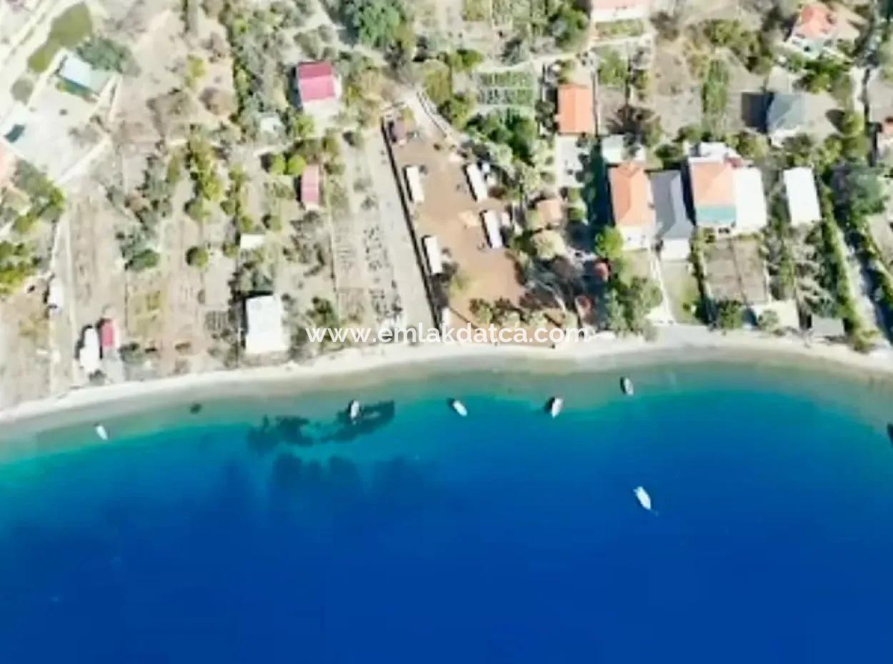 Einfamilienhaus Zum Verkauf Auf Einem 2000M2 Großen Grundstück Am Meer Im Viertel Marmaris Söğüt. Geeignet Zum Festbinden Eines Bootes Davor.