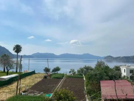 Detached House For Sale On 2000M2 Plot Of Land By The Sea In Marmaris Söğüt Neighborhood. Suitable For Tying A Boat In Front Of It.