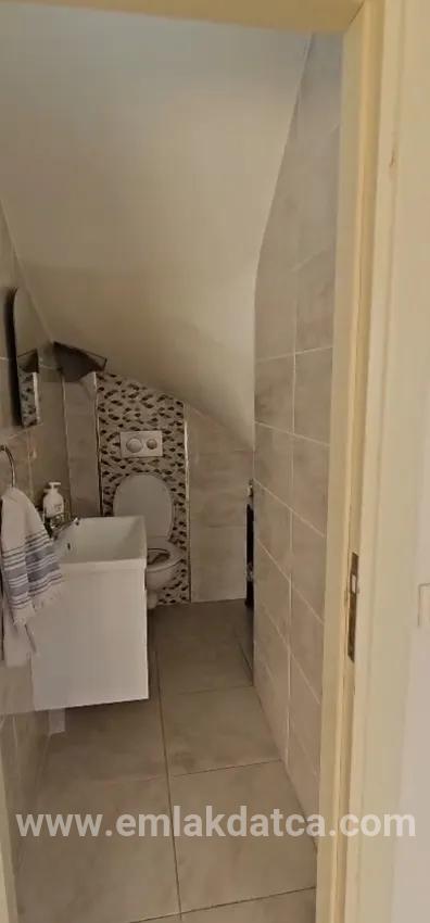 Beldibi’nde sıfır ayarında genç binada ferah ve geniş 3+1 kiralık daire
