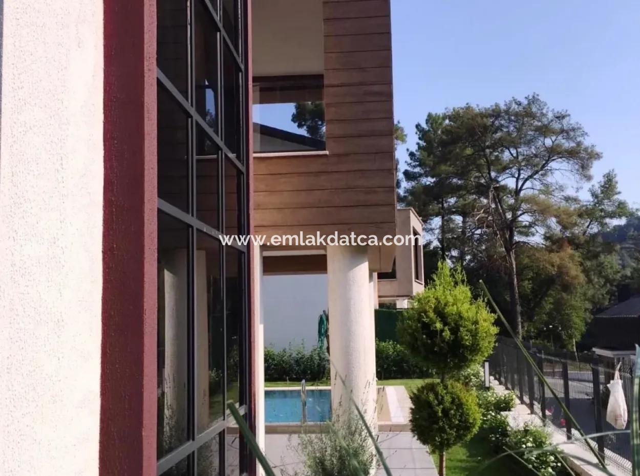 Marmaris İlçesi Beldibi Mahallesinde Satılık Müstakil Havuzlu 4 Oda 2 Salon 220 M2 Havuzlu Akıllı  Villa